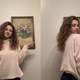 Two side-by-side images of Zoë standing in her bathroom with curly hair.